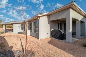 Back of house with a patio area