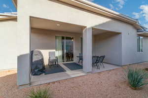 Back of property featuring a patio area