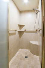 Bathroom with tiled shower