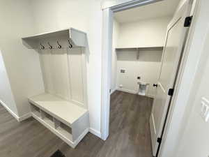 Mudroom with dark wood-type flooring