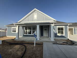 View of front of property with a porch