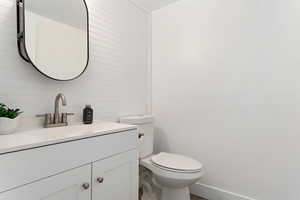 Bathroom featuring vanity and board and batten