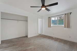 Master bedroom featuring ceiling fan.