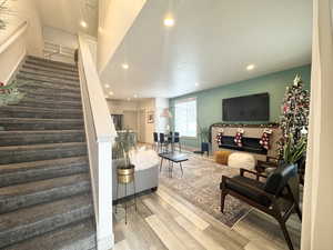 Living room with light wood-type flooring