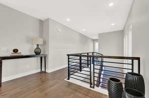 Hall featuring hardwood / wood-style floors