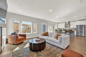 Living room with hardwood / wood-style floors