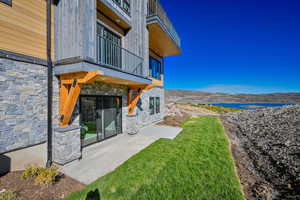 View of yard with a mountain view and a patio