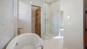 Bathroom with independent shower and bath