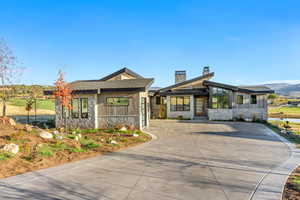 View of front of house with a mountain view