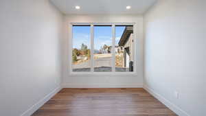 Spare room featuring hardwood / wood-style floors