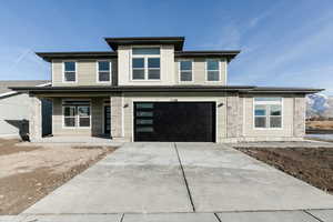 Modern-style home with a garage