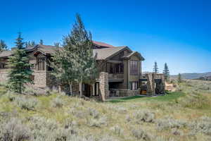 Back of property featuring a balcony