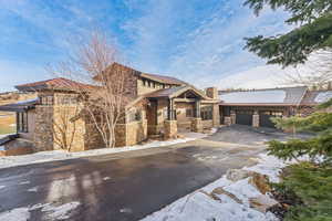 View of front of home featuring a garage