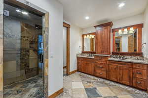 Bathroom with vanity and an enclosed shower