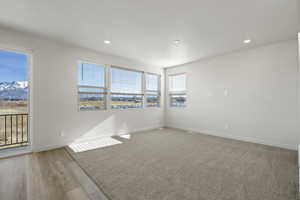 Spare room featuring light wood-type flooring