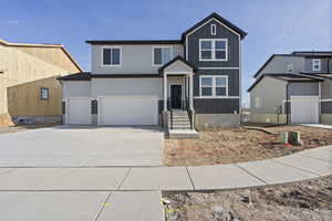 View of front of home featuring a garage