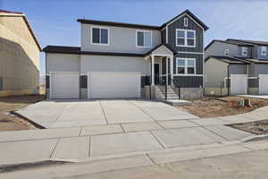 Front of property featuring a garage