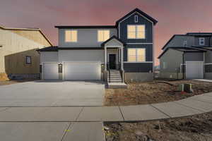 View of front facade with a garage