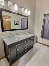 Downstairs master bathroom with walk in closet.