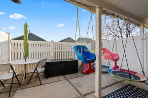 View of patio / terrace featuring a playground