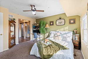 Bedroom featuring carpet floors, a closet, and ceiling fan