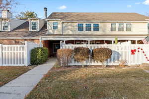 View of front of house featuring a front yard