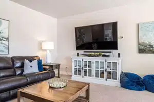 Living room with carpet floors