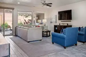 Living room featuring ceiling fan