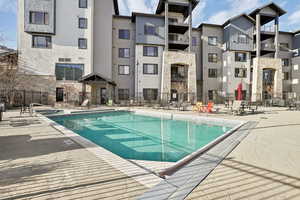 View of pool featuring a patio