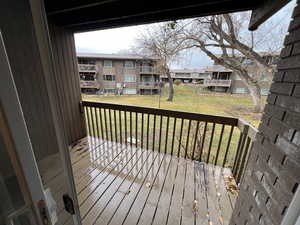 Wooden deck with a lawn