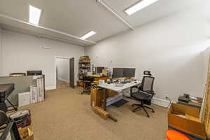 View of carpeted home office