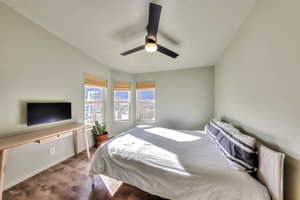 Bedroom with hardwood / wood-style flooring and ceiling fan