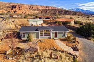 Single story home featuring a mountain view