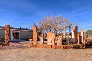 Rear view of property with a patio