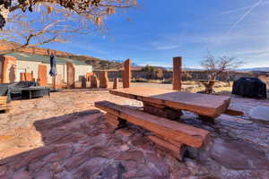 View of patio / terrace featuring grilling area and a mountain view