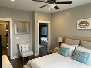 Bedroom featuring dark hardwood / wood-style floors and ceiling fan
