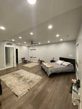 Bedroom featuring dark hardwood / wood-style floors
