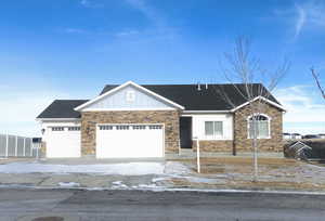 View of front of home featuring a garage