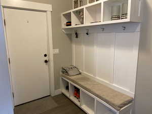 Mudroom with dark hardwood / wood-style floors