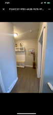 Hall with wood-type flooring