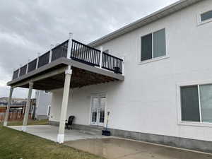 Back of property featuring a patio