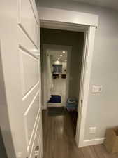 Hall with wood-type flooring