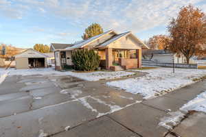 View of front of property featuring and a garage