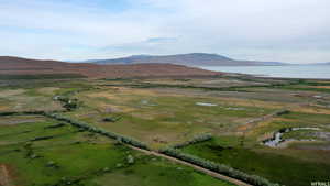 Aerial view with a rural view and a water and mountain view