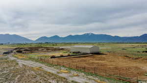 Property view of mountains featuring a rural view