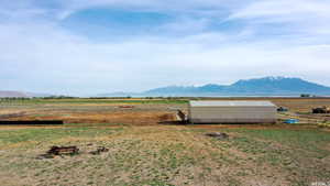 Property view of mountains featuring a rural view