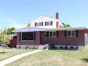 View of front of home with a front yard