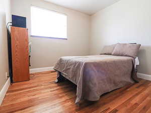 Bedroom featuring light wood-type flooring