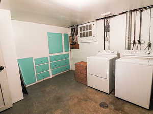 Laundry room featuring washing machine and dryer