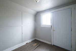 Interior space featuring light lvp flooring and a textured ceiling